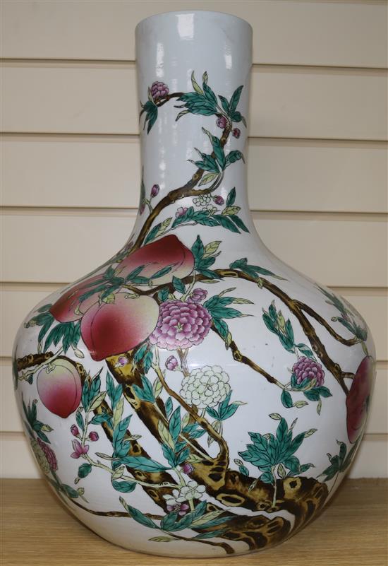 A Chinese famille rose nine-peach vase, Qianlong mark but later